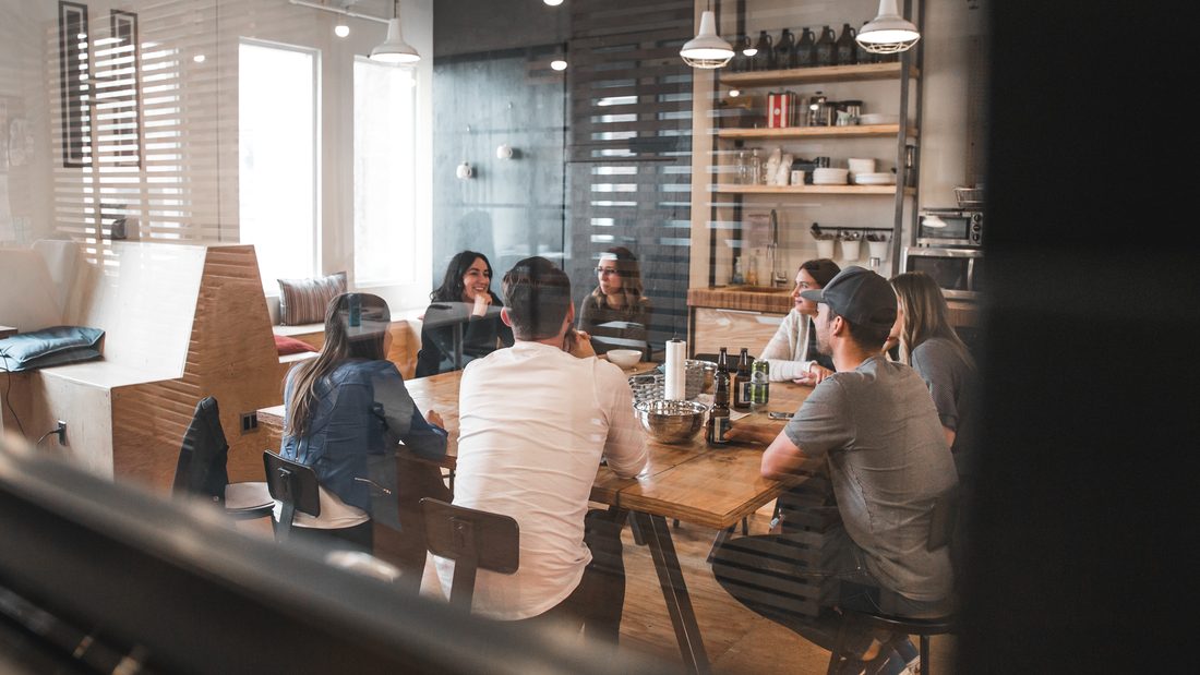 A team in conversation around a table